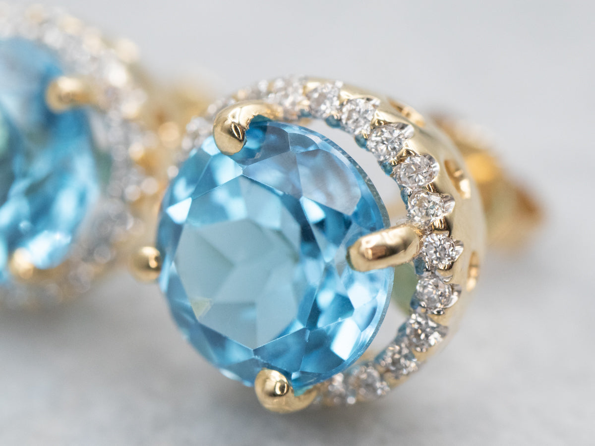 Yellow Gold Blue Topaz and Diamond Halo Stud Earrings