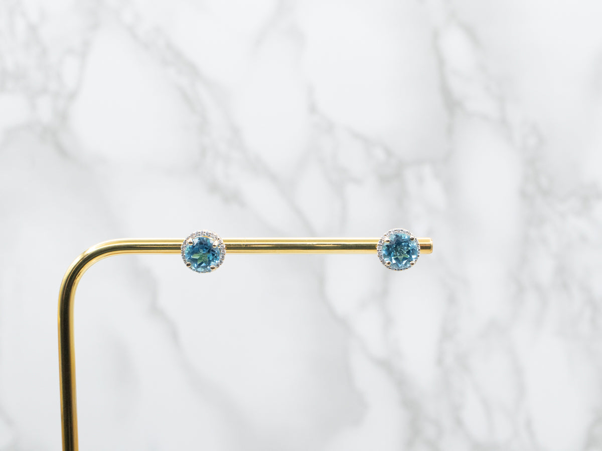 Yellow Gold Blue Topaz and Diamond Halo Stud Earrings