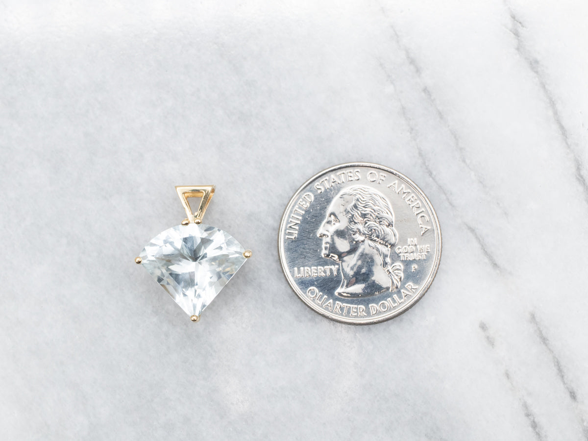Fancy Cut Blue Topaz Pendant in Yellow Gold
