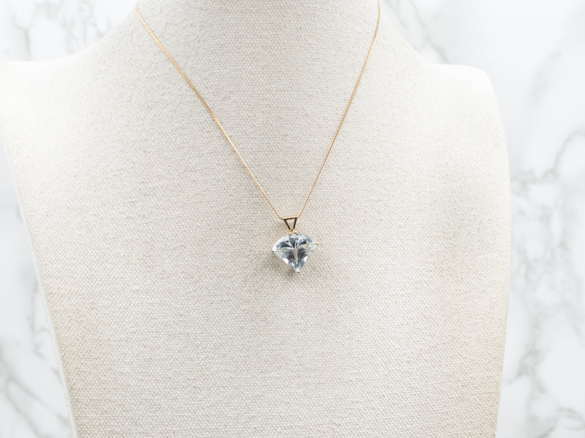 Fancy Cut Blue Topaz Pendant in Yellow Gold