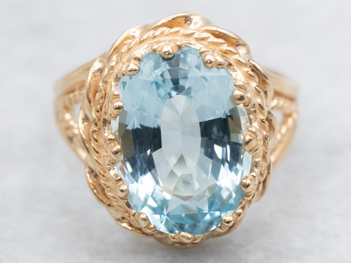 Nautical Gold Blue Topaz Solitaire Ring