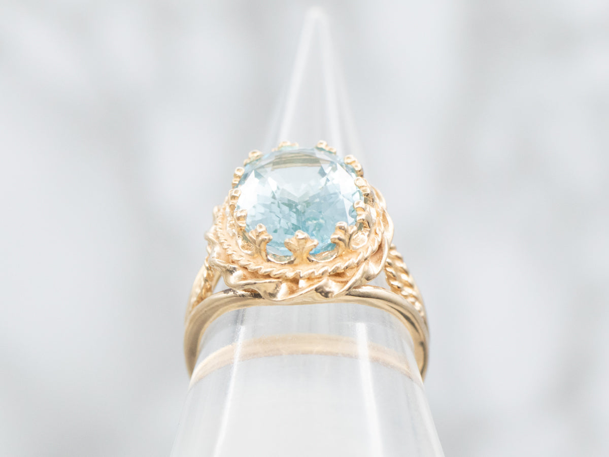 Nautical Gold Blue Topaz Solitaire Ring