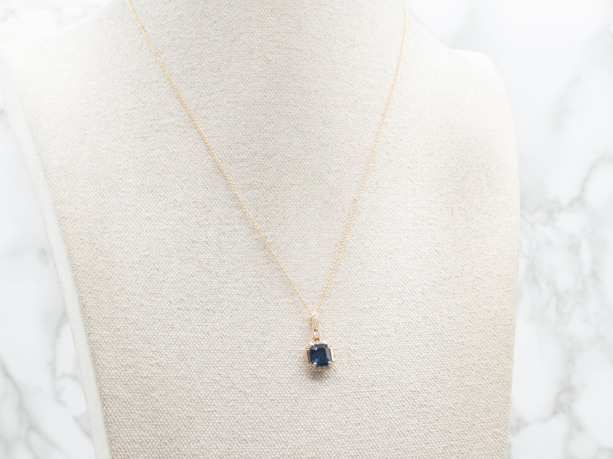 Modern Gold Sapphire and Diamond Pendant on Cable Chain