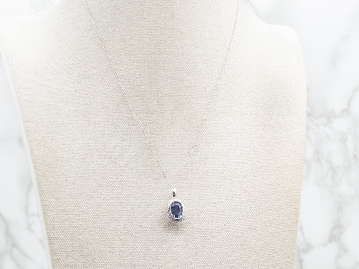 Bezel Set Sapphire Halo Pendant on Cable Chain