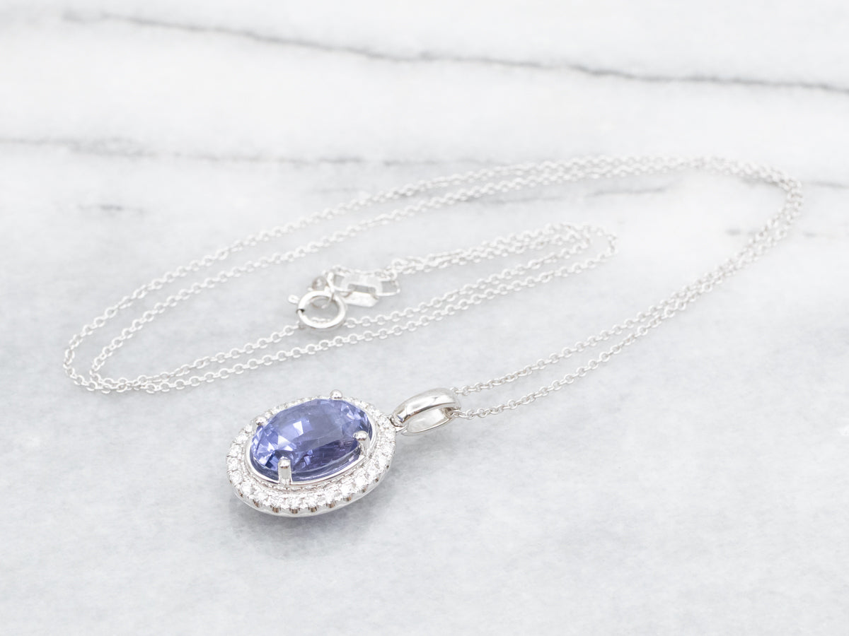 Modern Sapphire Halo Pendant on Cable Chain