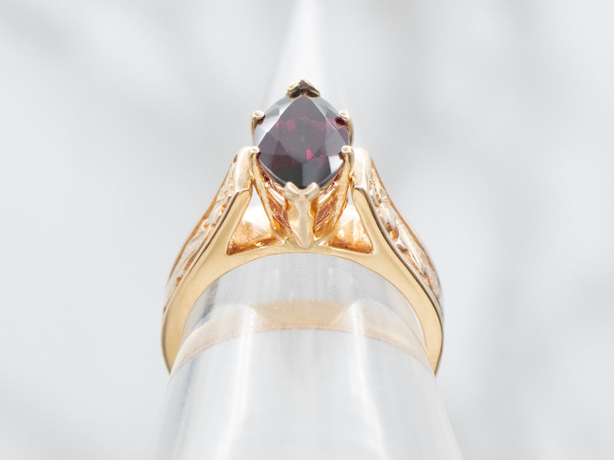 Marquise Cut Garnet Solitaire Ring with Floral Shoulders