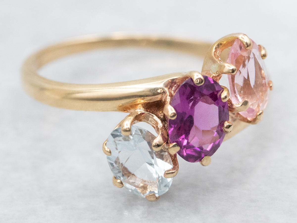 Pink Tourmaline Aquamarine and Garnet Bypass Ring