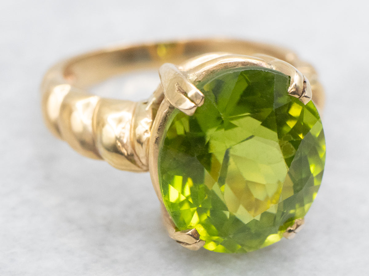 Bold Peridot and Curvaceous Gold Statement Ring