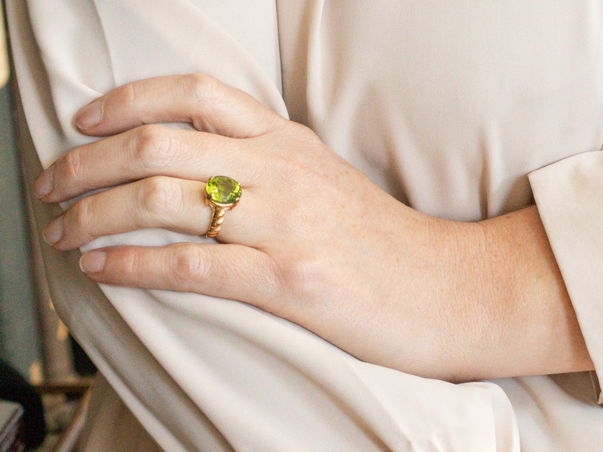 Bold Peridot and Curvaceous Gold Statement Ring