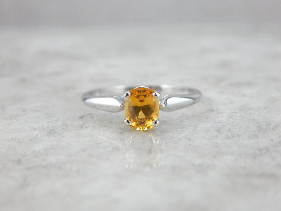 Golden Sapphire and White Gold Solitaire Engagement Ring