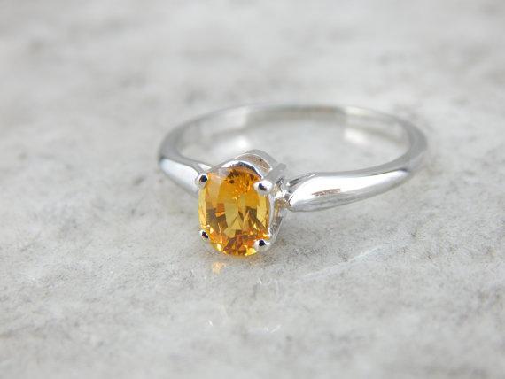 Golden Sapphire and White Gold Solitaire Engagement Ring