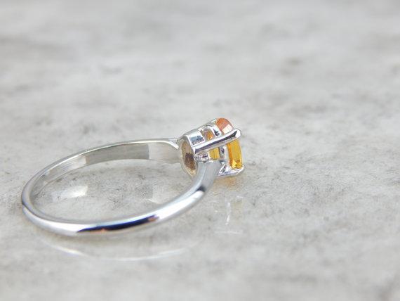 Golden Sapphire and White Gold Solitaire Engagement Ring