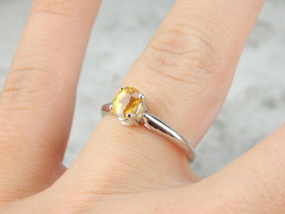 Golden Sapphire and White Gold Solitaire Engagement Ring