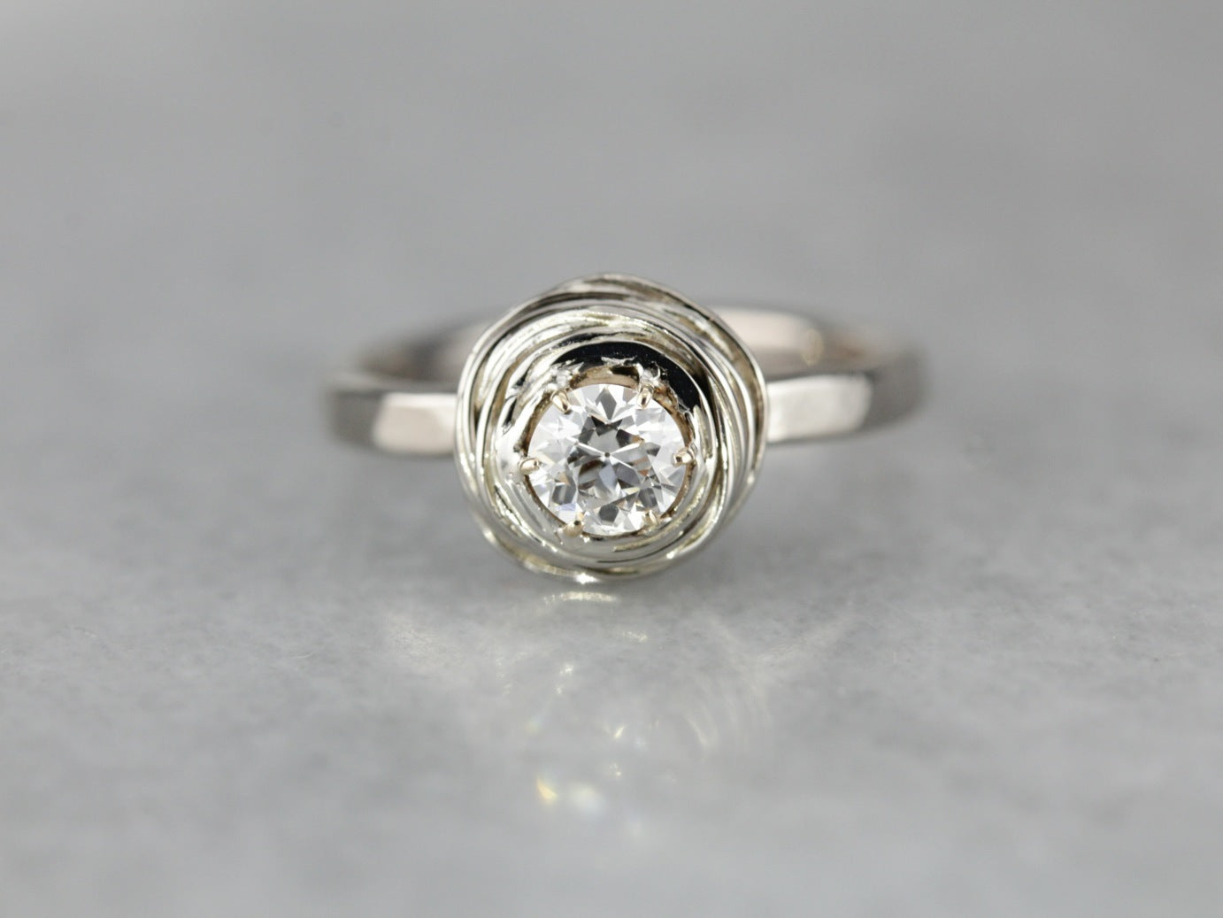 Modernist Diamond Nest Solitaire Engagement Ring