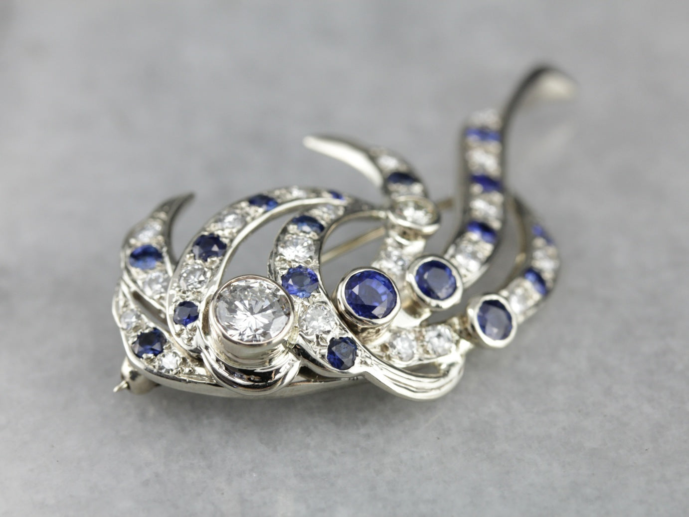 Retro Era Diamond and Sapphire Cocktail Brooch