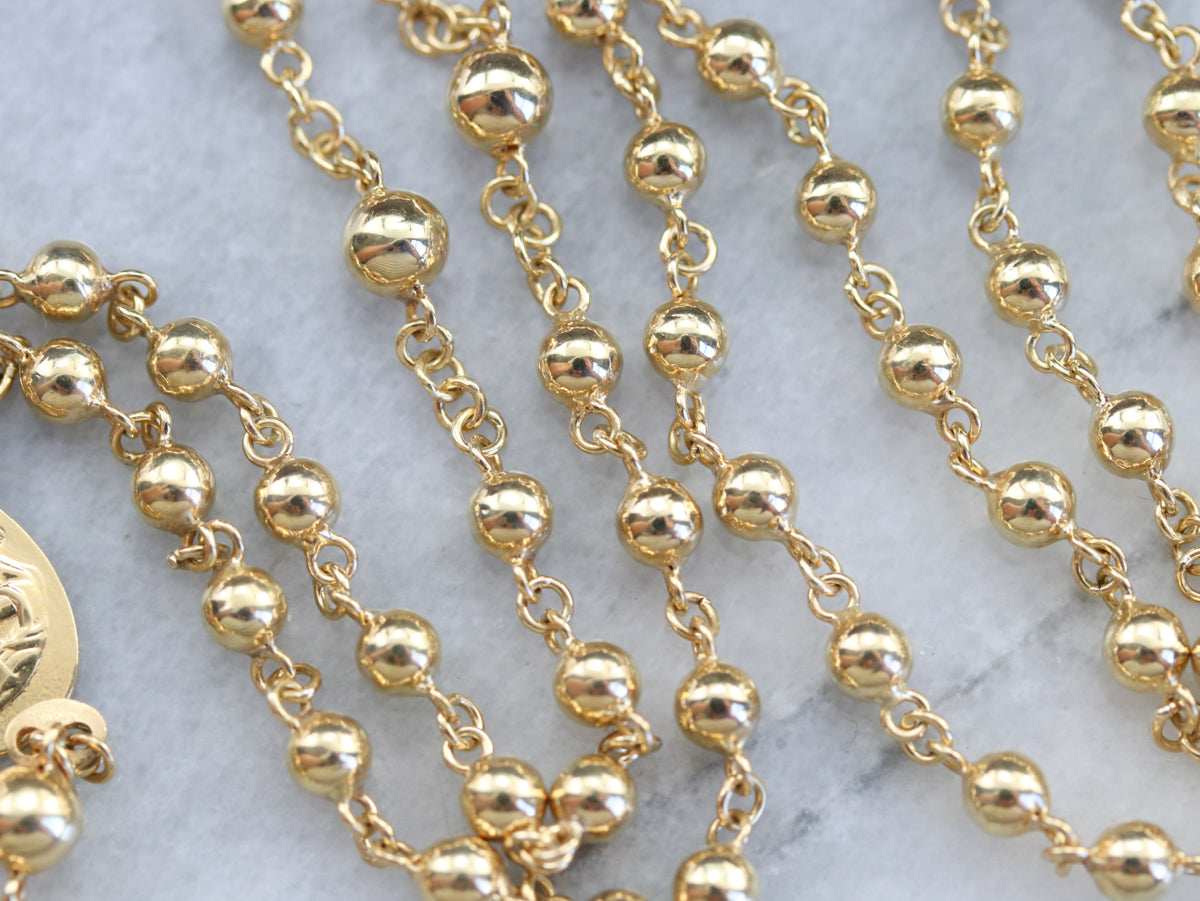 Modernist Gold Rosary Bead Necklace