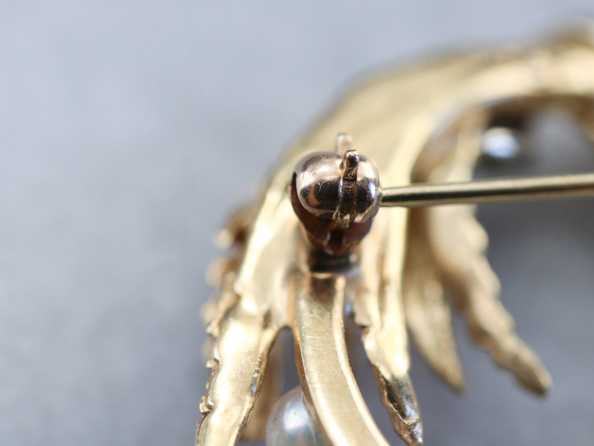 Wishbone gold tone with pearl accent shops brooch.