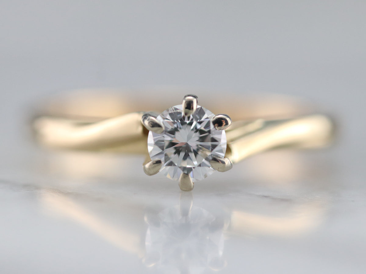 Modern Twisting Diamond Solitaire Engagement Ring