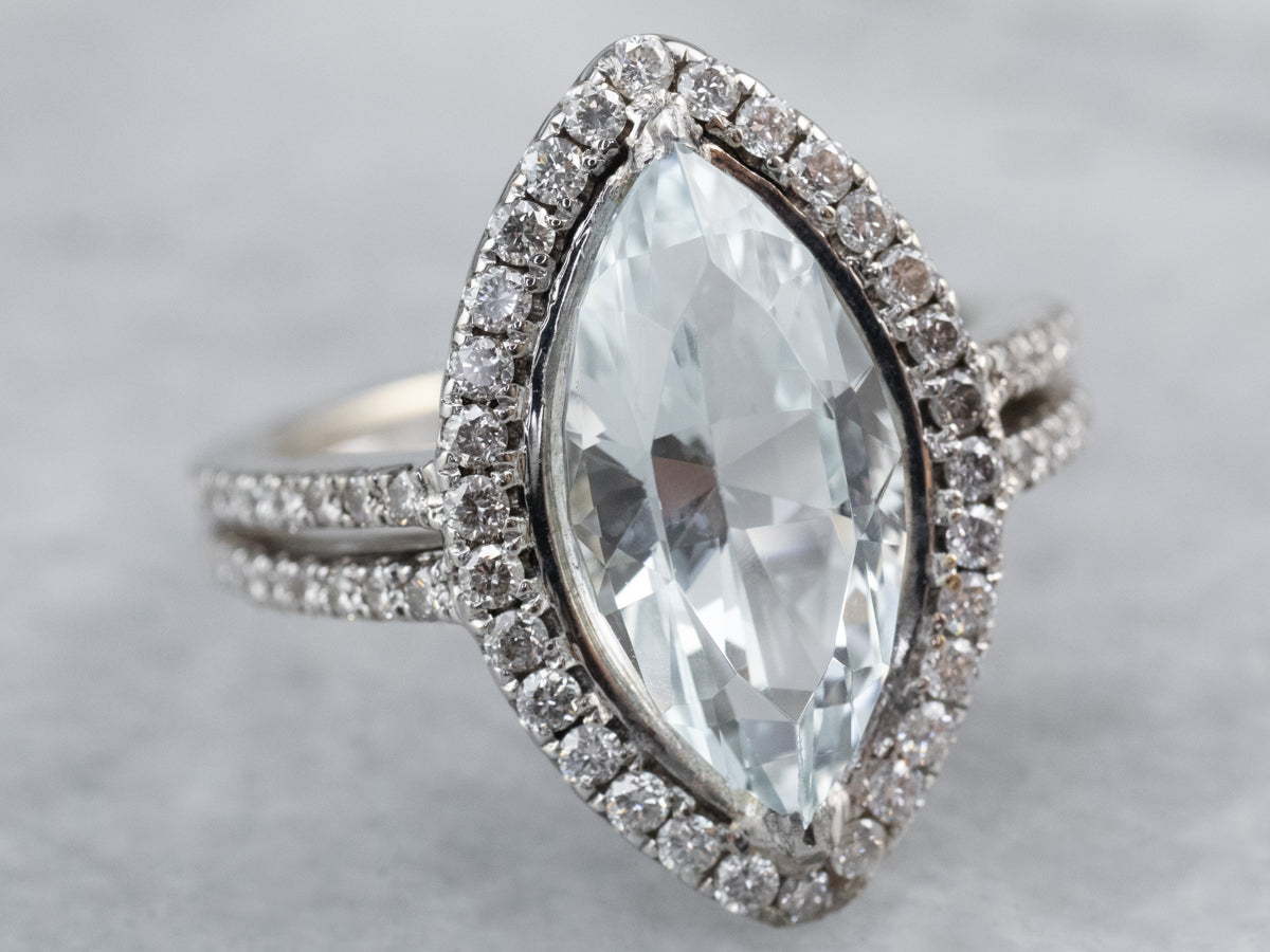 Aquamarine and Diamond Halo Ring