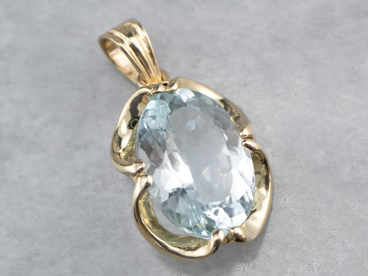 Gold Blue Topaz Solitaire Pendant