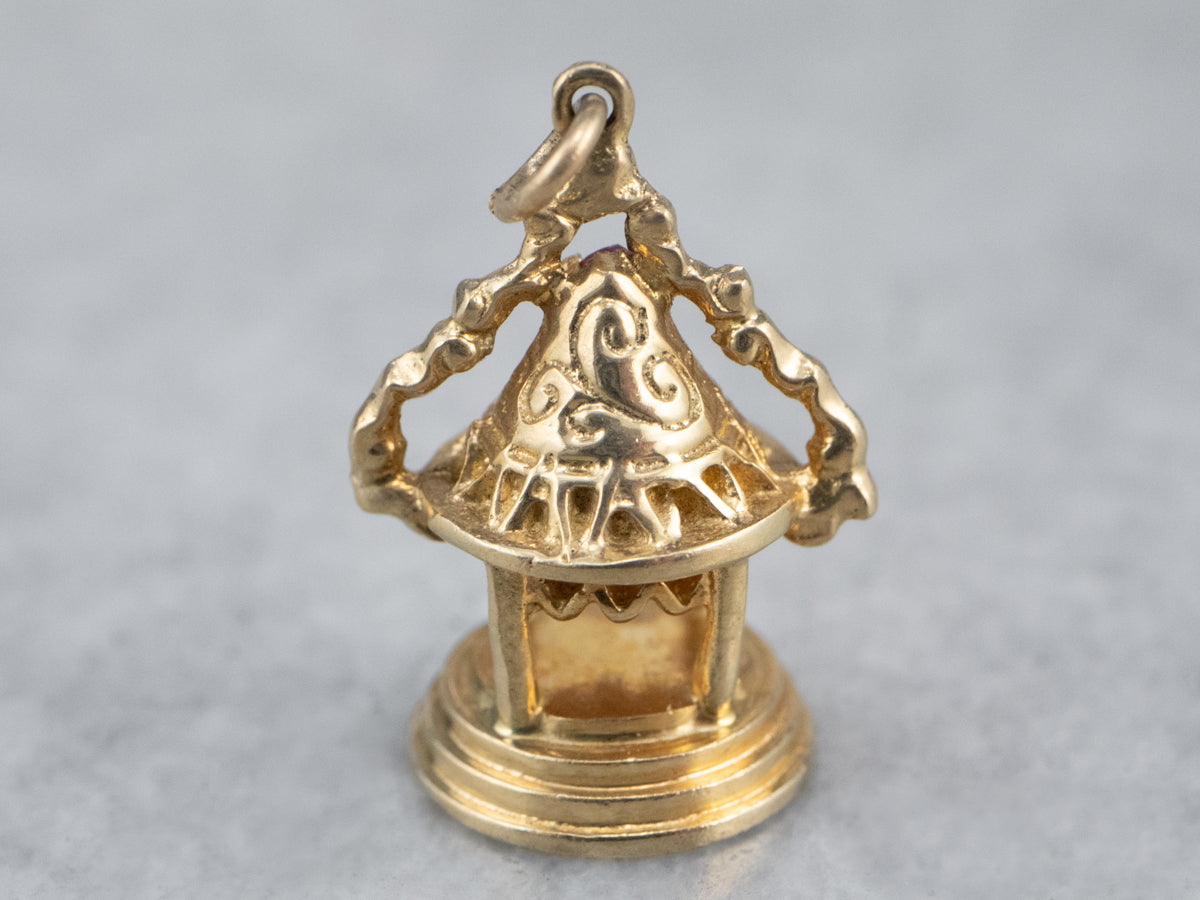 Ornate Gold and Ruby Temple Charm