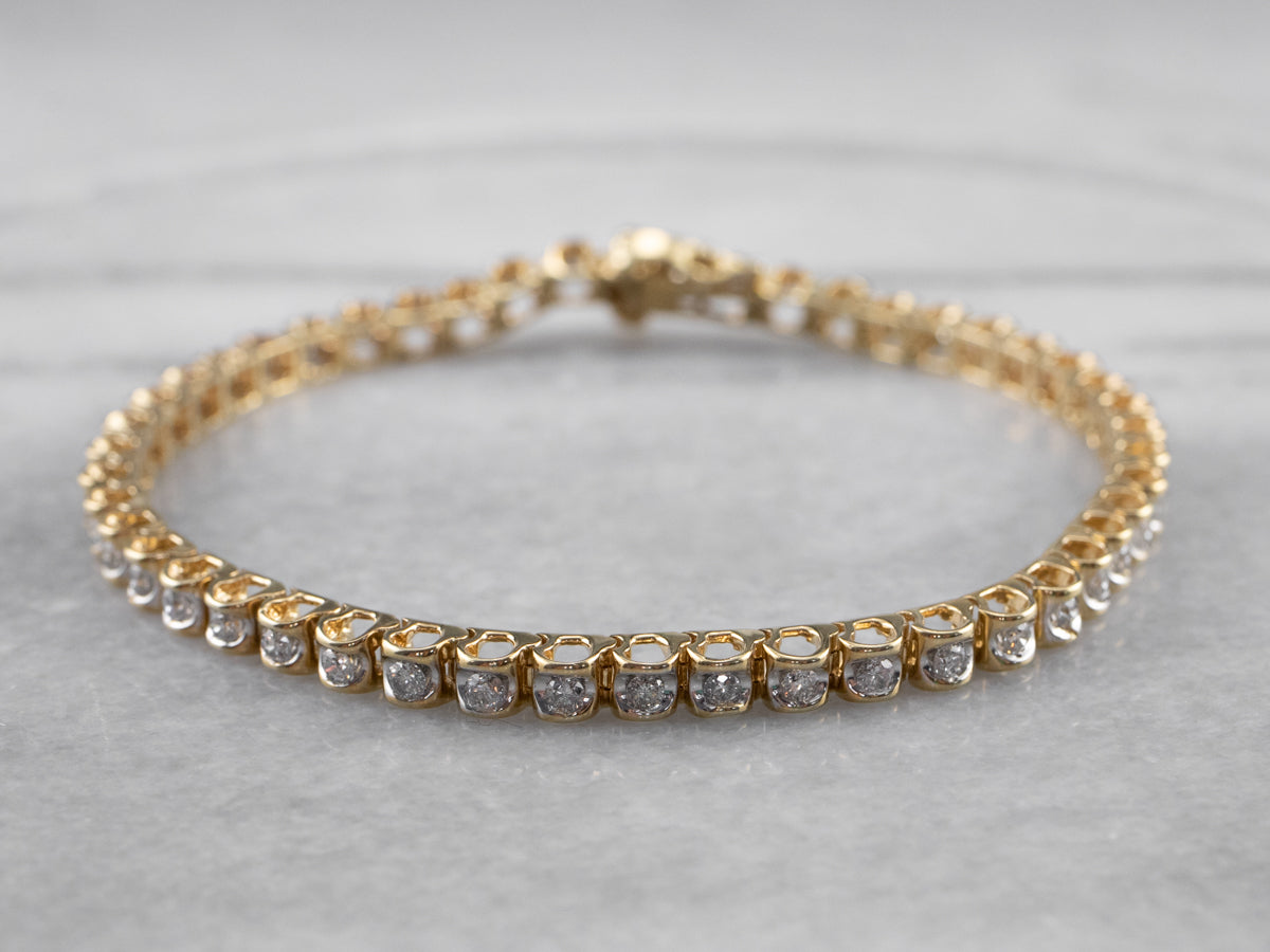 Pulsera de tenis de oro amarillo con diamantes