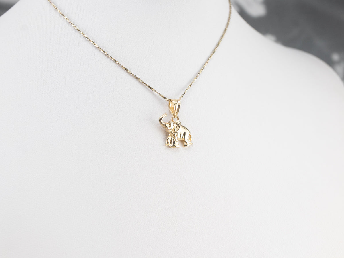 Raised Trunk Elephant Gold Pendant