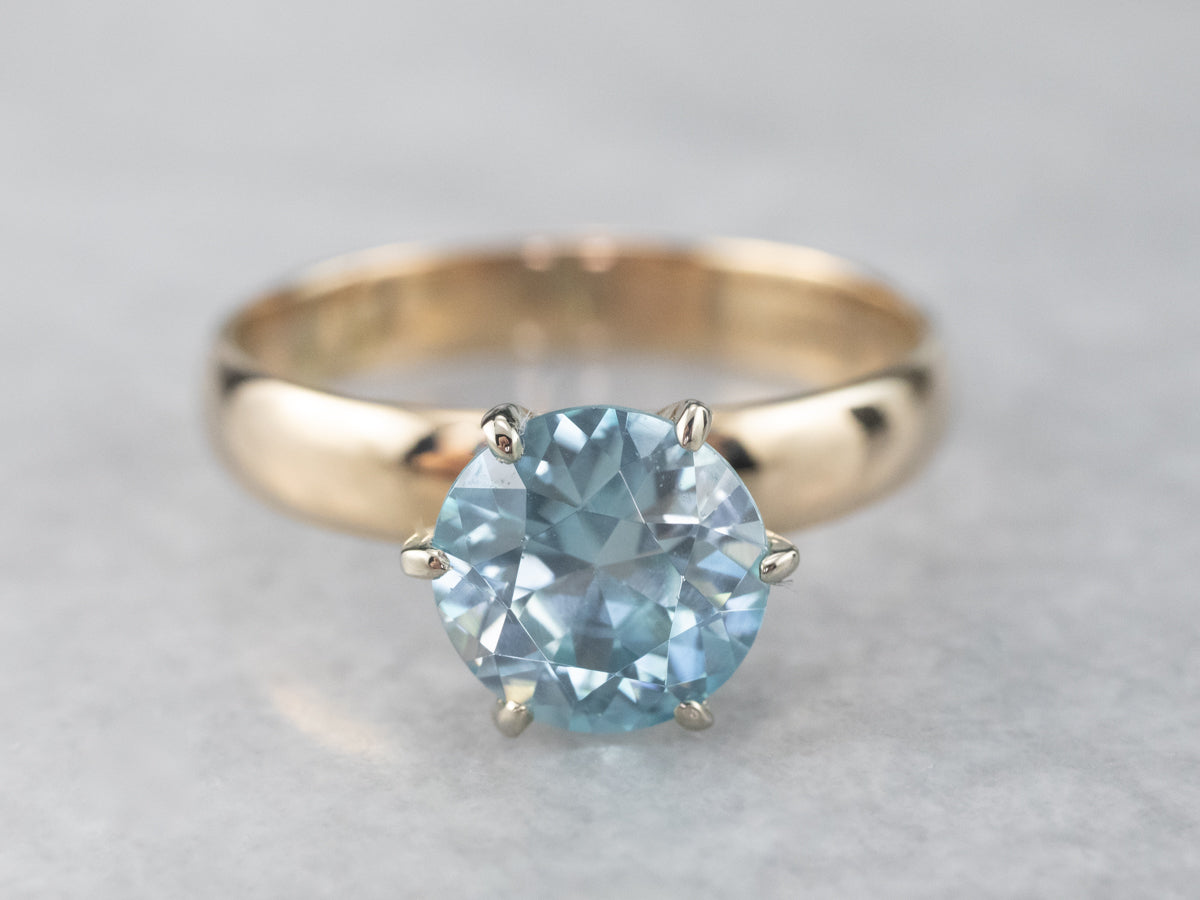 Blue Zircon Two Tone Gold Solitaire Ring