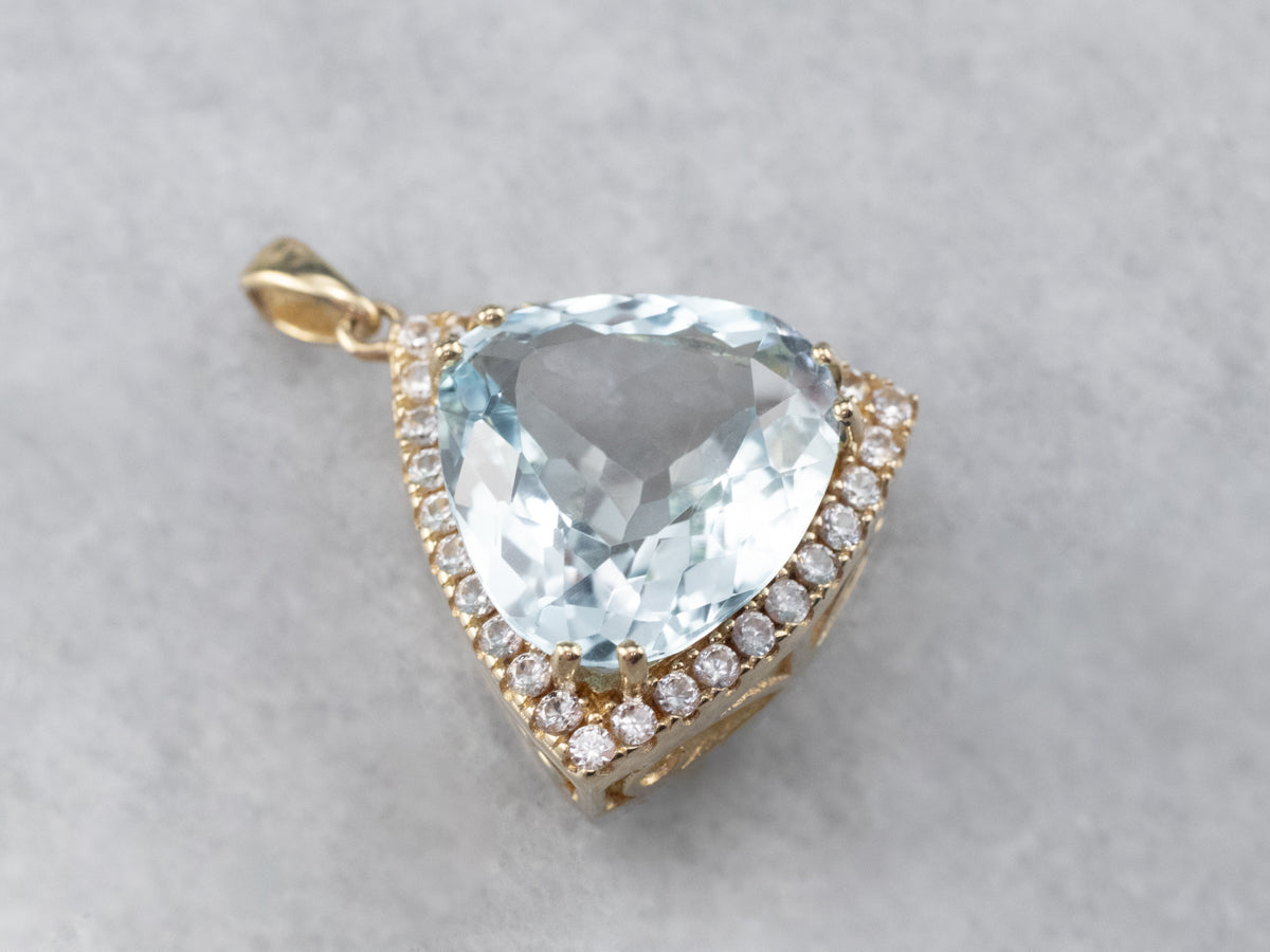 Blue Topaz White Sapphire Gold Halo Pendant