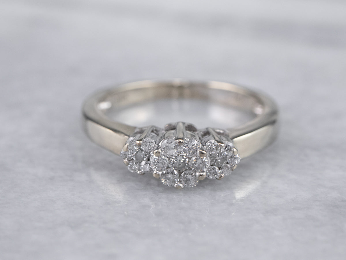 Three Diamond Halo Engagement Ring