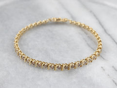 Champagne diamond on sale tennis bracelet