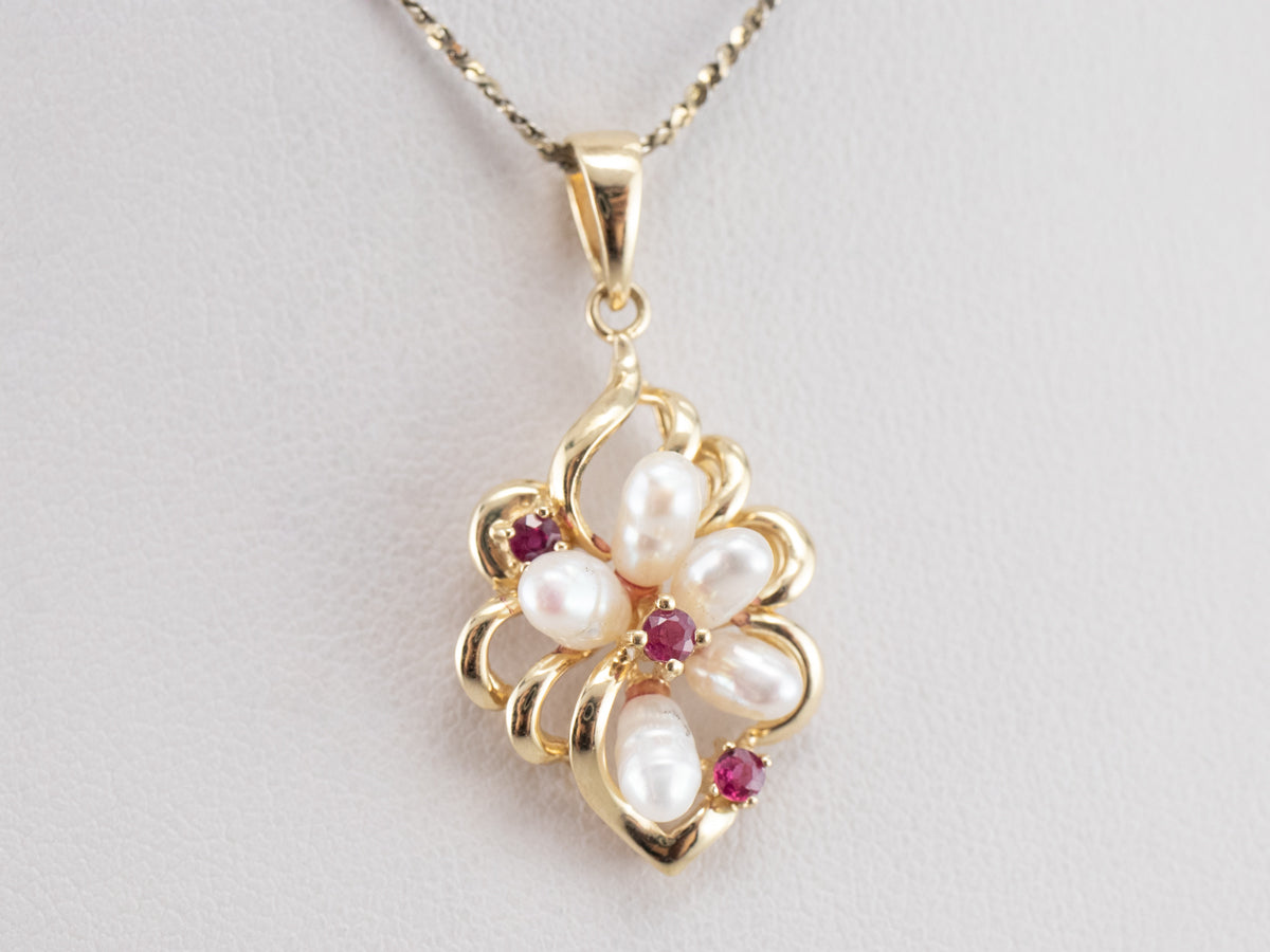 Vintage 1970’s faux pearl necklace adorned with faux ruby 2024 pendant.