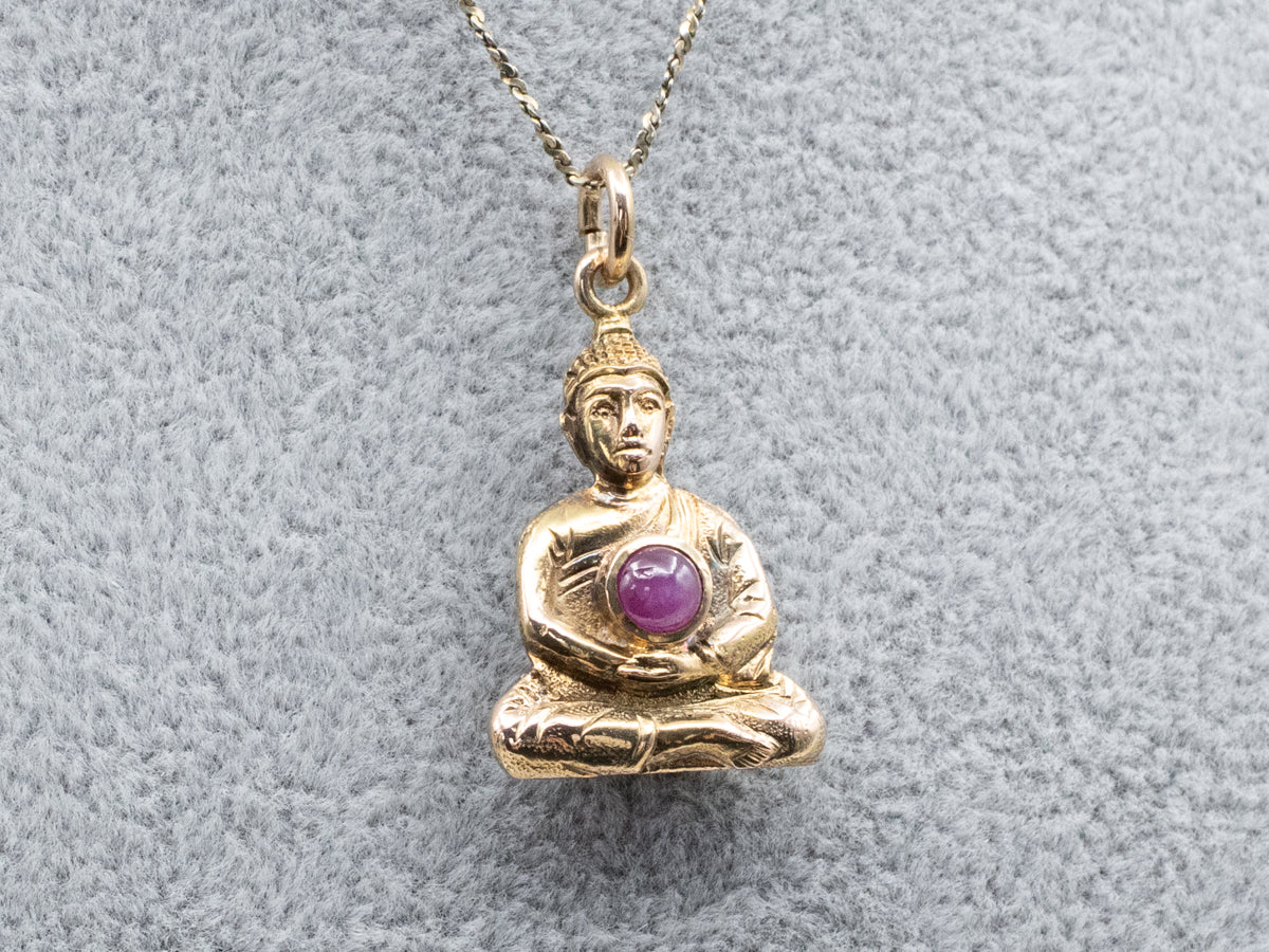 Gold Star Ruby Buddha Pendant