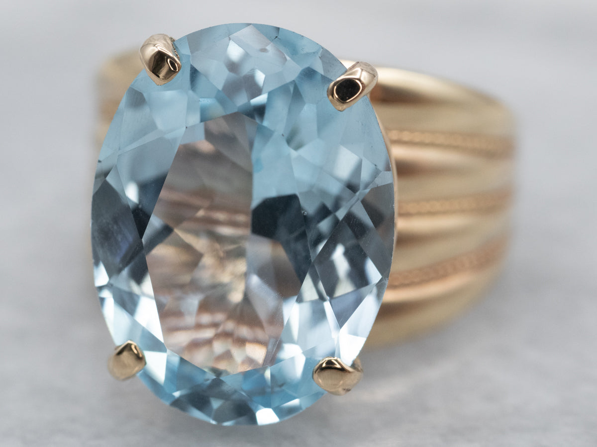 Gold Blue Topaz Cocktail Ring