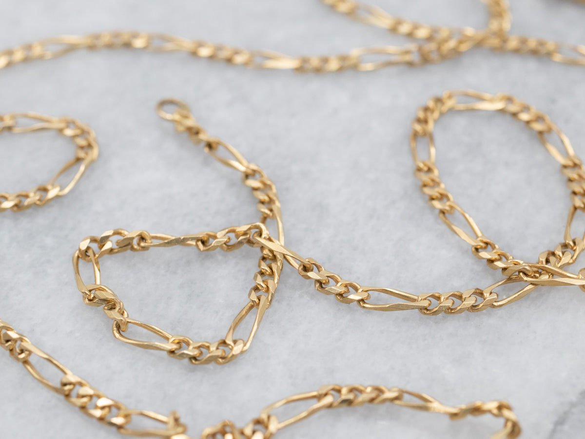 Long 18K Yellow Gold Figaro Chain