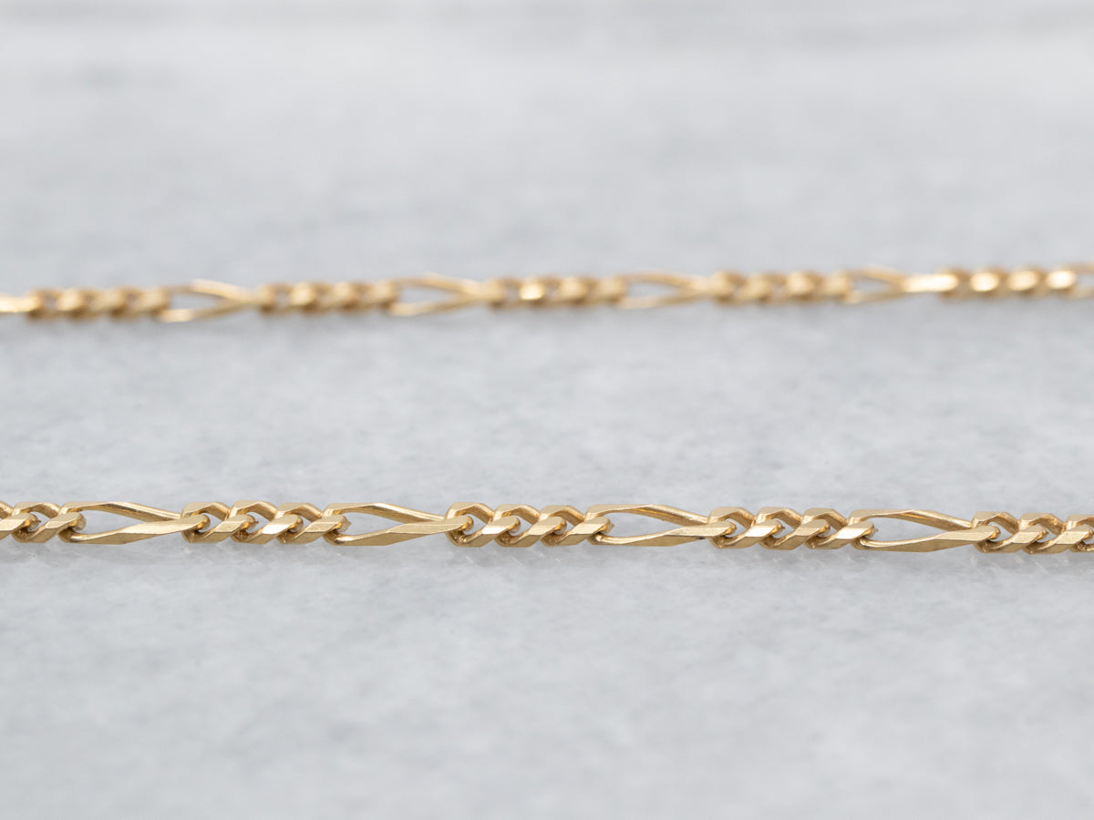 Long 18K Yellow Gold Figaro Chain