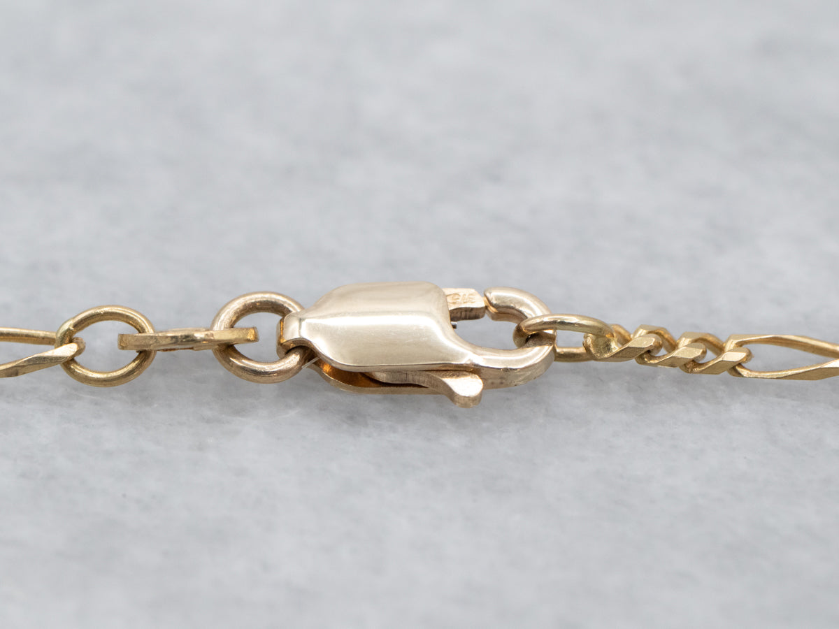 Long 18K Yellow Gold Figaro Chain