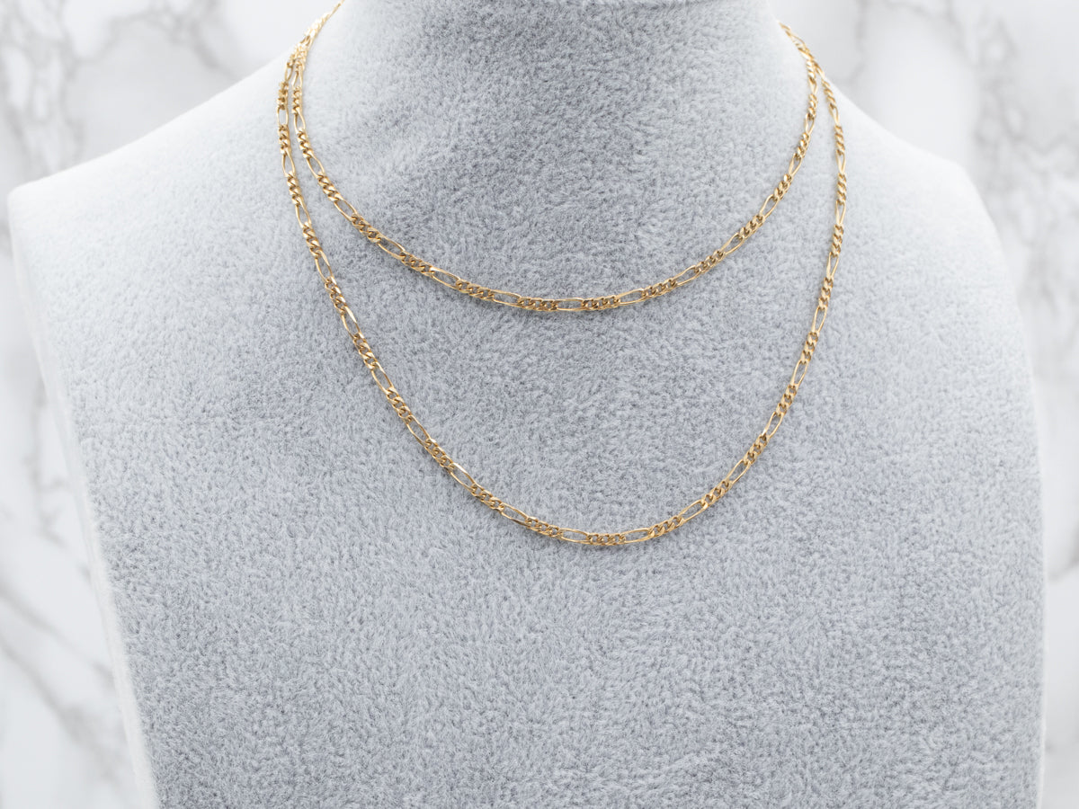 Long 18K Yellow Gold Figaro Chain