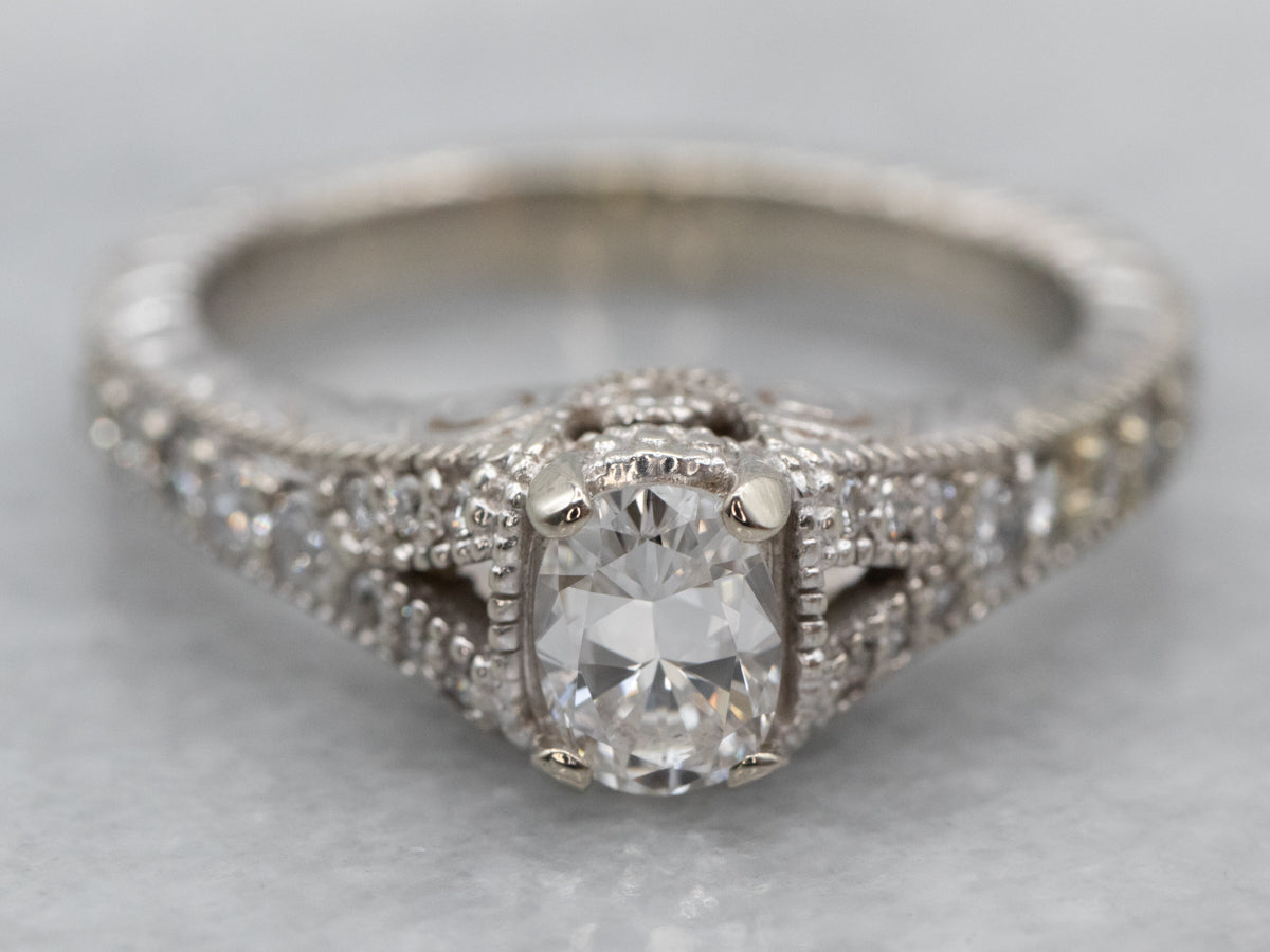 Modern Oval Diamond Halo Engagement Ring