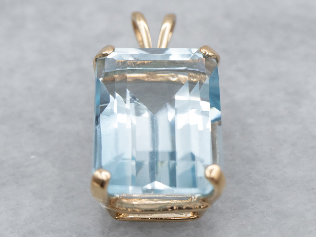 Blue Topaz Solitaire Pendant in Yellow Gold