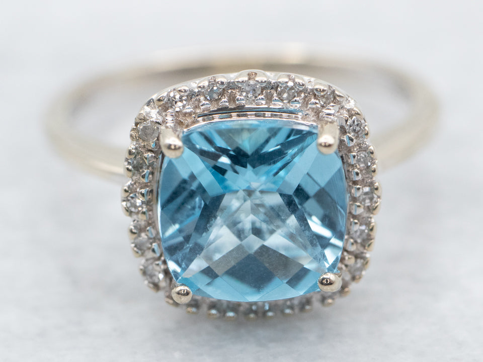 Modern Blue Topaz Diamond Halo Ring