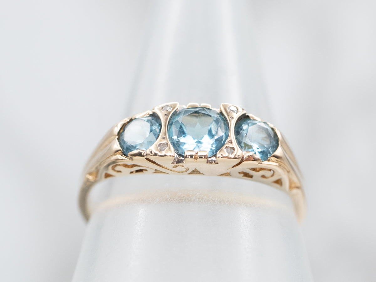 Shimmering Yellow Gold Blue Topaz and Diamond Ring