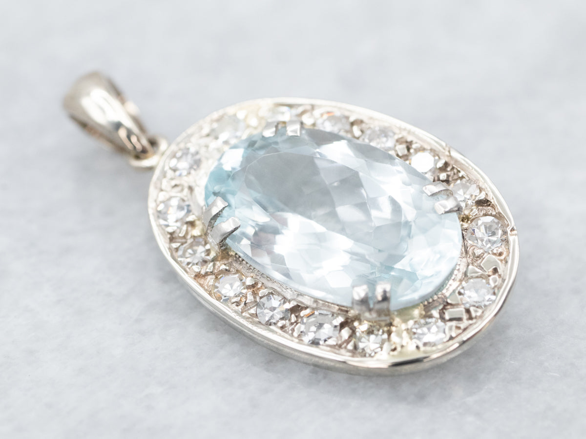 Alluring Blue Topaz and Diamond Halo Pendant