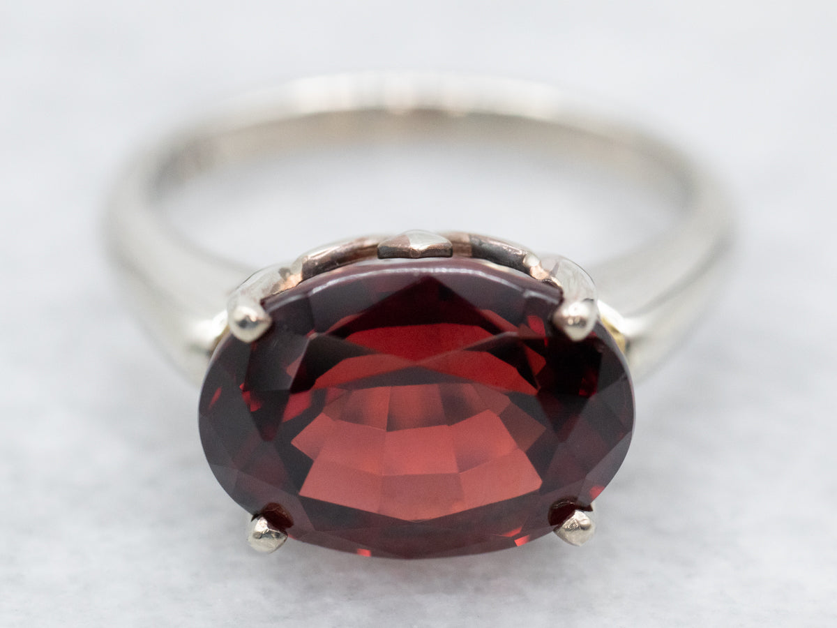 East-West Garnet Solitaire Ring