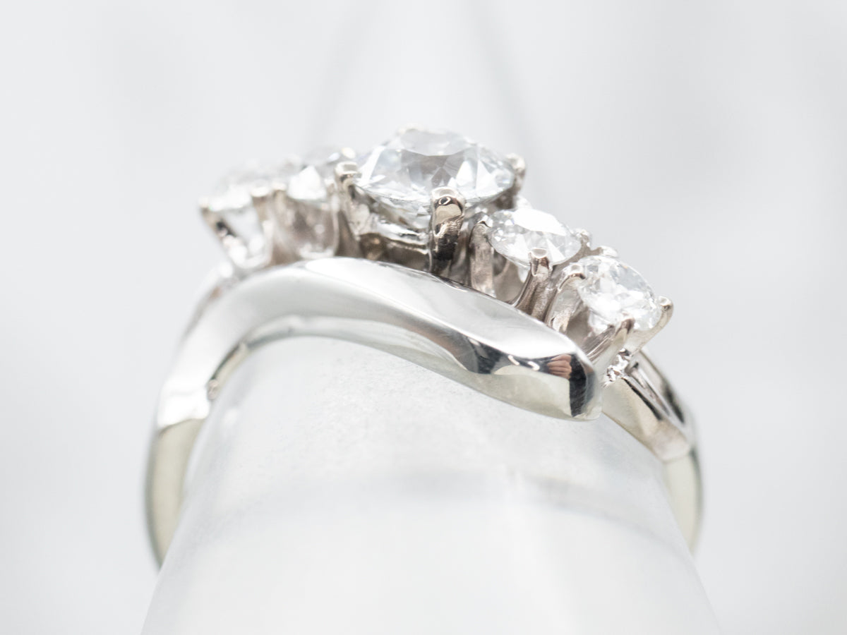 Scrolling Diamond Bypass-Style Engagement Ring