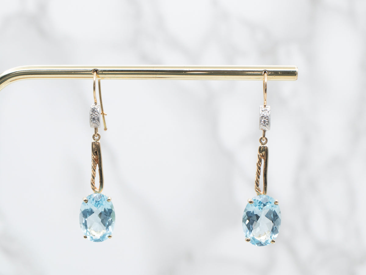 Twisting Blue Topaz and Diamond Drop Earrings