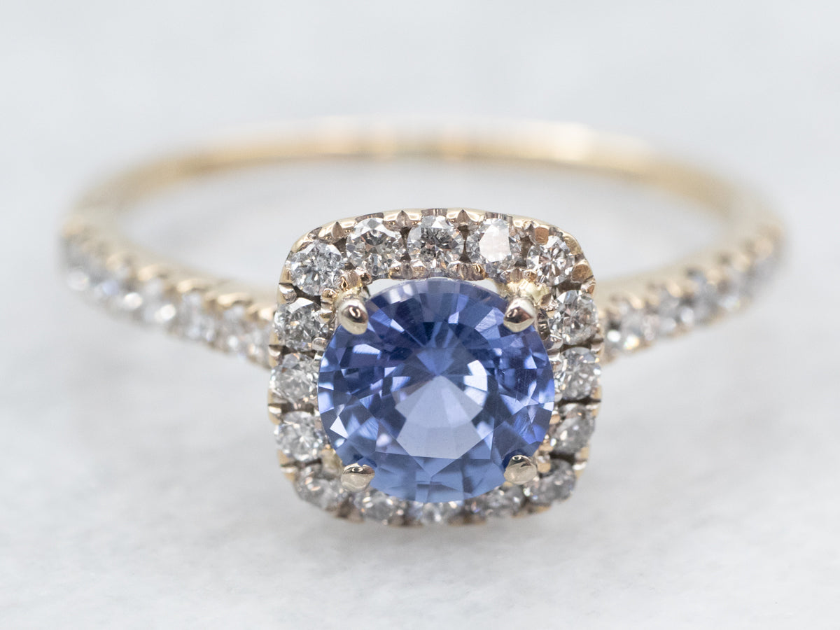 Blue Sapphire and Diamond Halo Ring