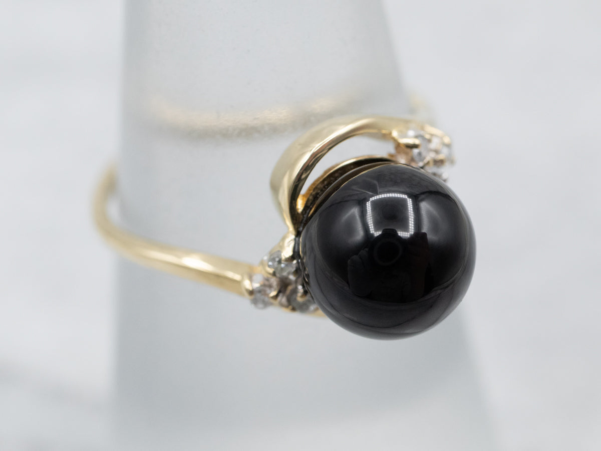 Deep Black Onyx and Diamond Bypass Ring