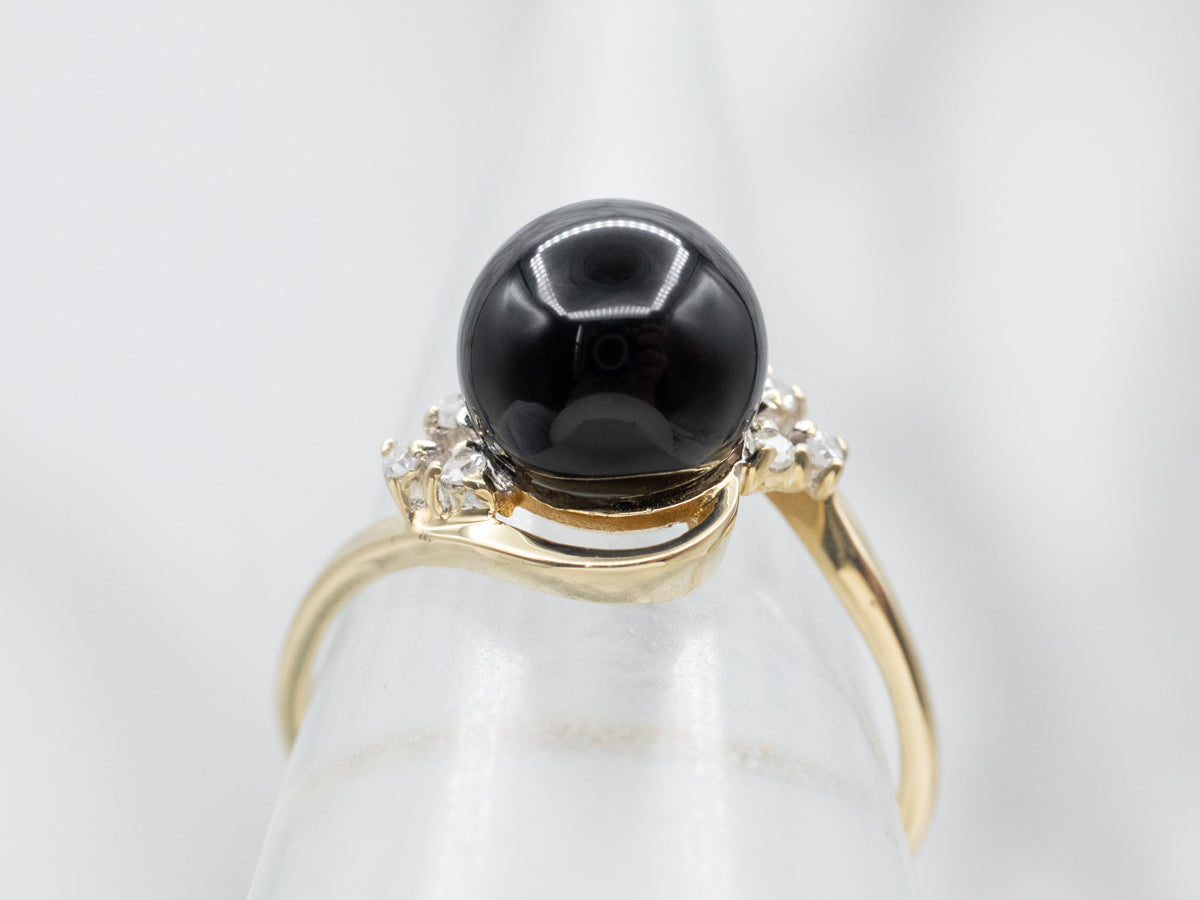 Deep Black Onyx and Diamond Bypass Ring