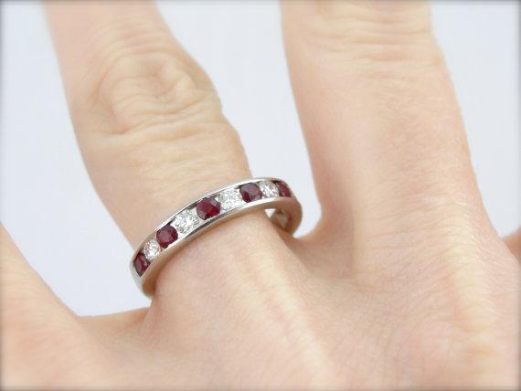 Classic Platinum Diamond and Ruby Channel Set Wedding Band